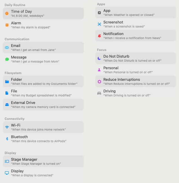 The Automation list in Shortcuts on macOS 27, laid out here in two columns: Time of Day, Alarm, Email, Message, Folder, File, External Drive, Wi-Fi, Bluetooth, Stage Manager, Display, App, Screenshot, Notification and four Focus modes.